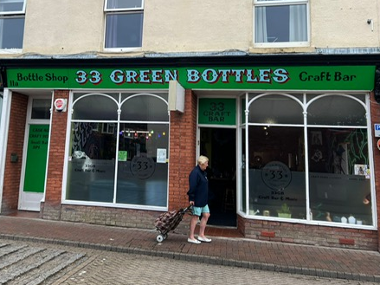 Green Bottles sign